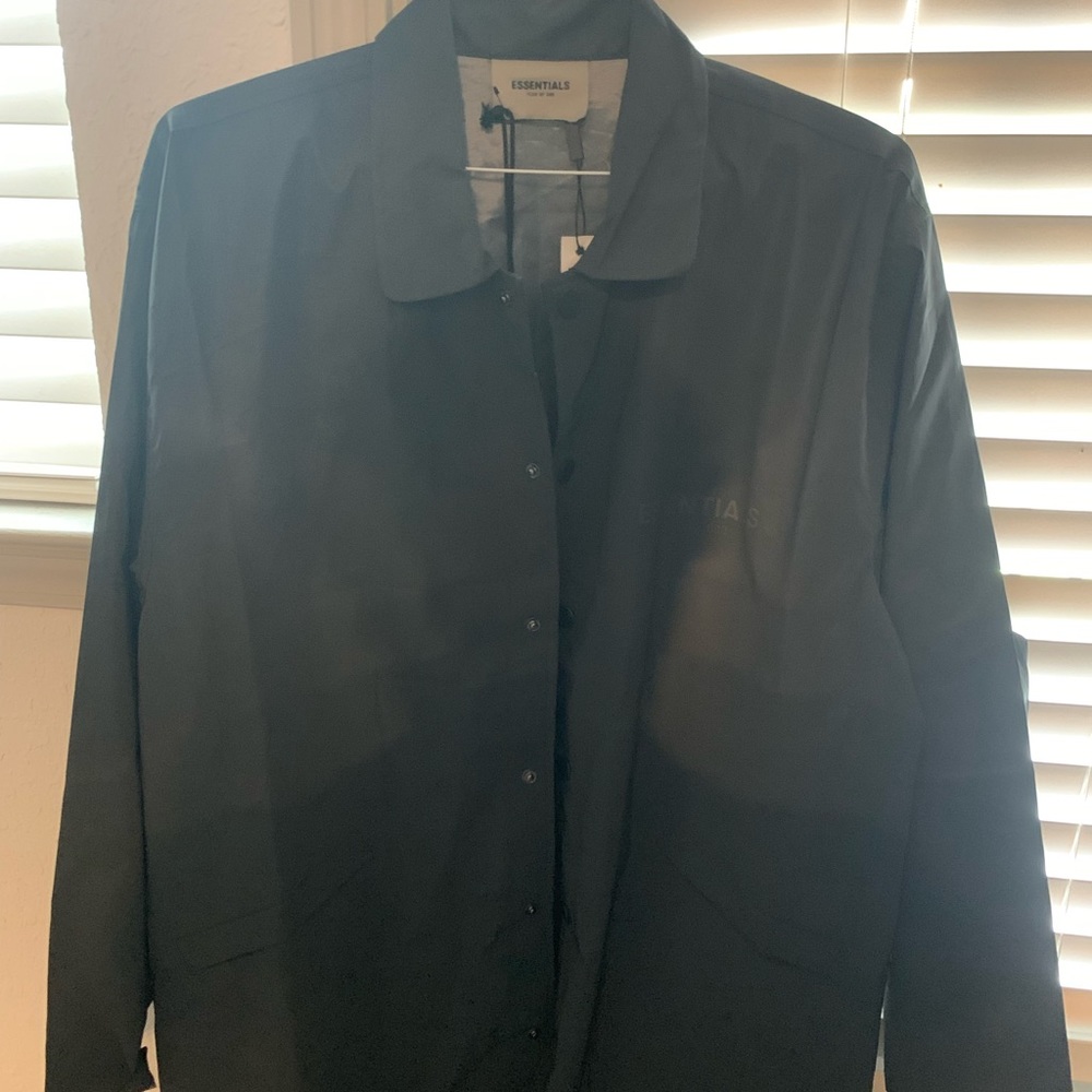 Fear of god Essentials black reflective coach jacket